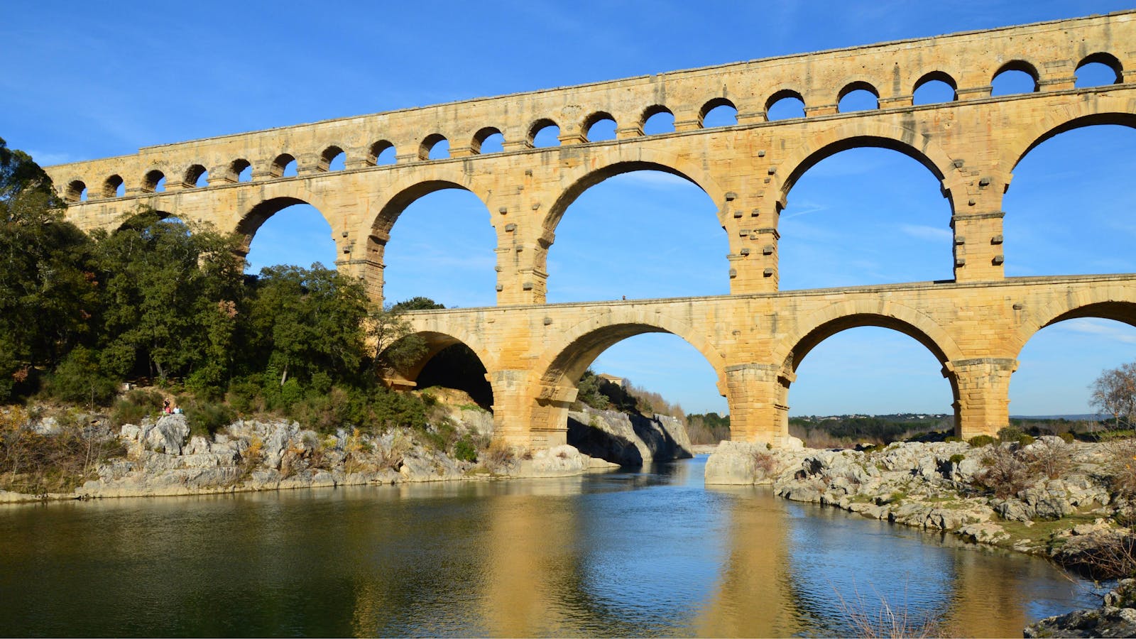 Captivating view of the ancient Pont du Gard aqueduct in Remoulins, France.