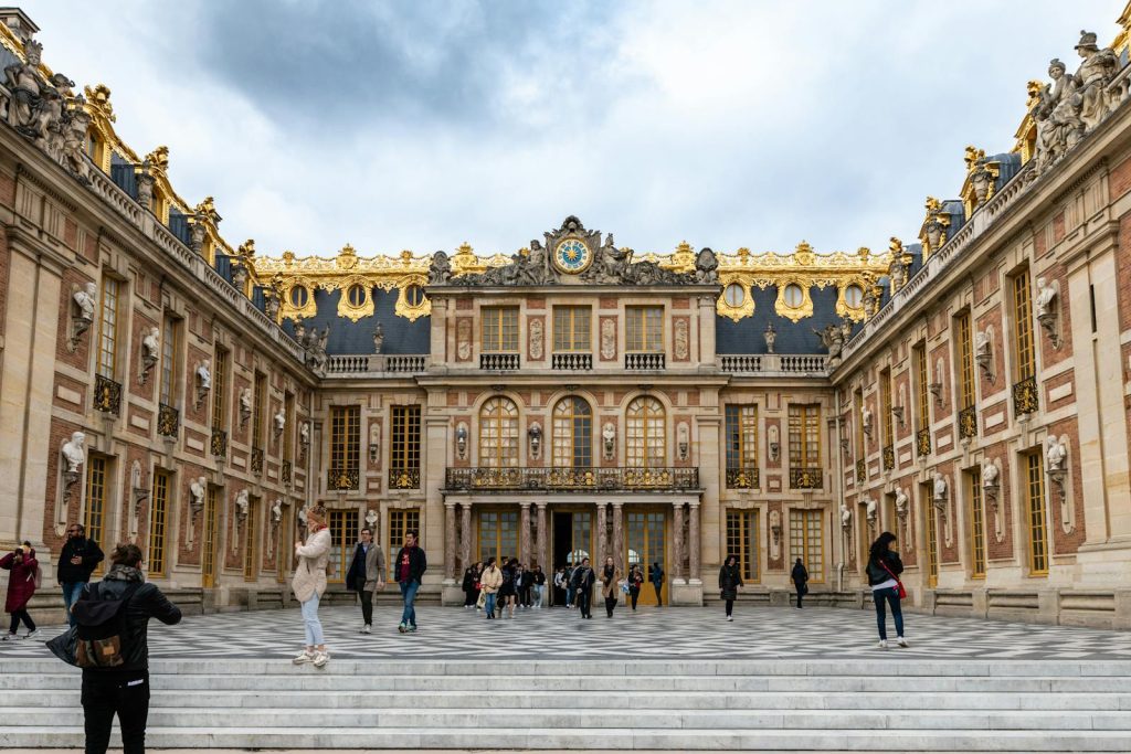 Stunning view of the Palace of Versailles showcasing its baroque architecture and ornate facade.